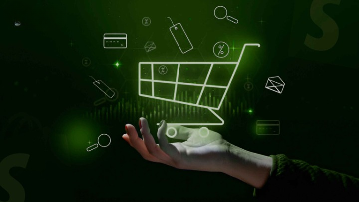 E-commerce Development - Hand presenting digital shopping cart with floating icons